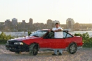 Me standing with door open, Drivers Side, City in behind